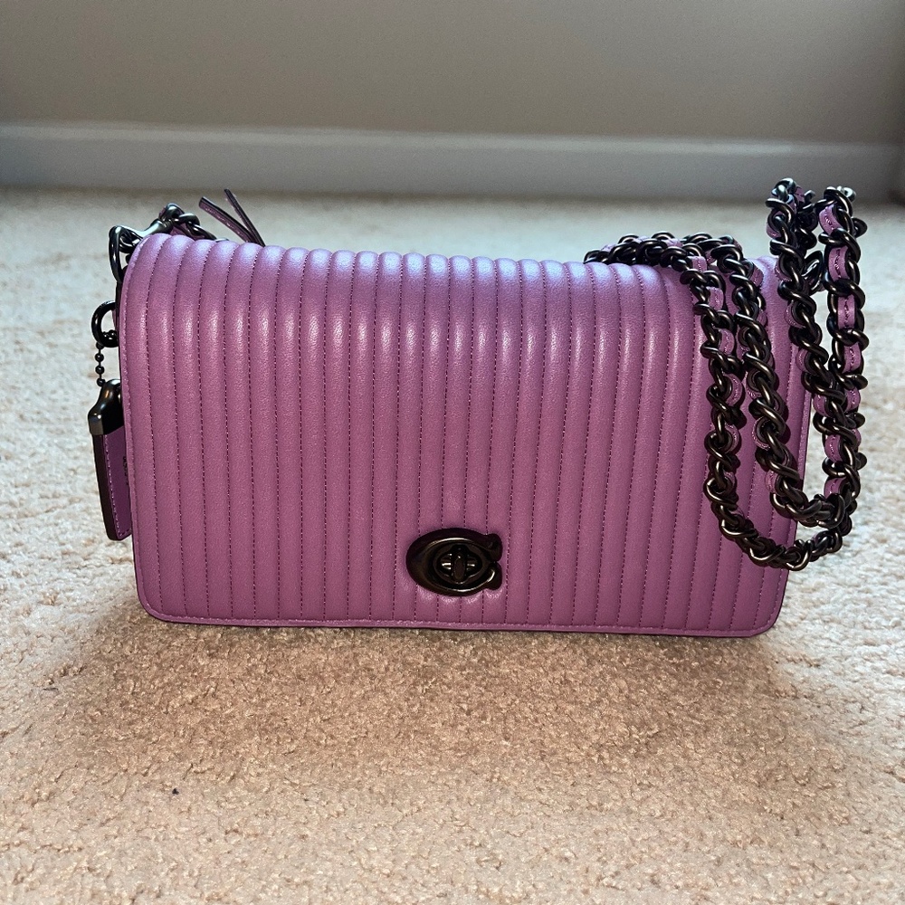 Coach Dinky in the color primrose